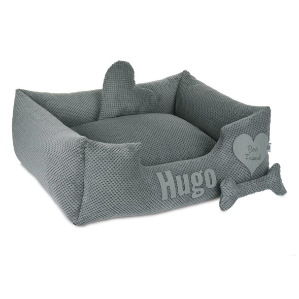Personalizowane legowisko Hugo – wygodne miejsce do odpoczynku dla psa Legowisko Hugo w szarym kolorze z wysokimi bokami i poduszkami w kształcie serca i kości